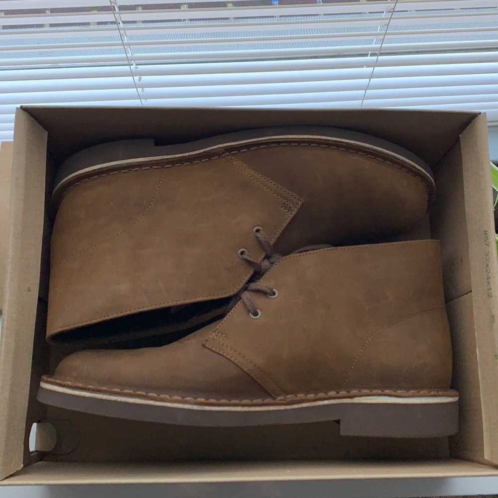 Brown suede men’s chukka boots by Clark’s